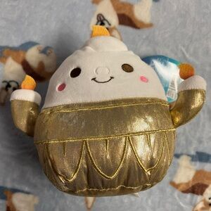 Gold and White Plush Toy